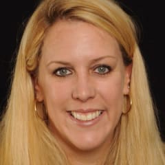 A circular avatar of Amy Wenzel