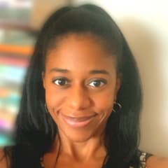 A circular avatar of Krystal Lewis