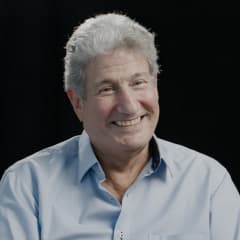 A circular avatar of Roger Solomon