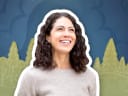 woman in front of tree and sky background