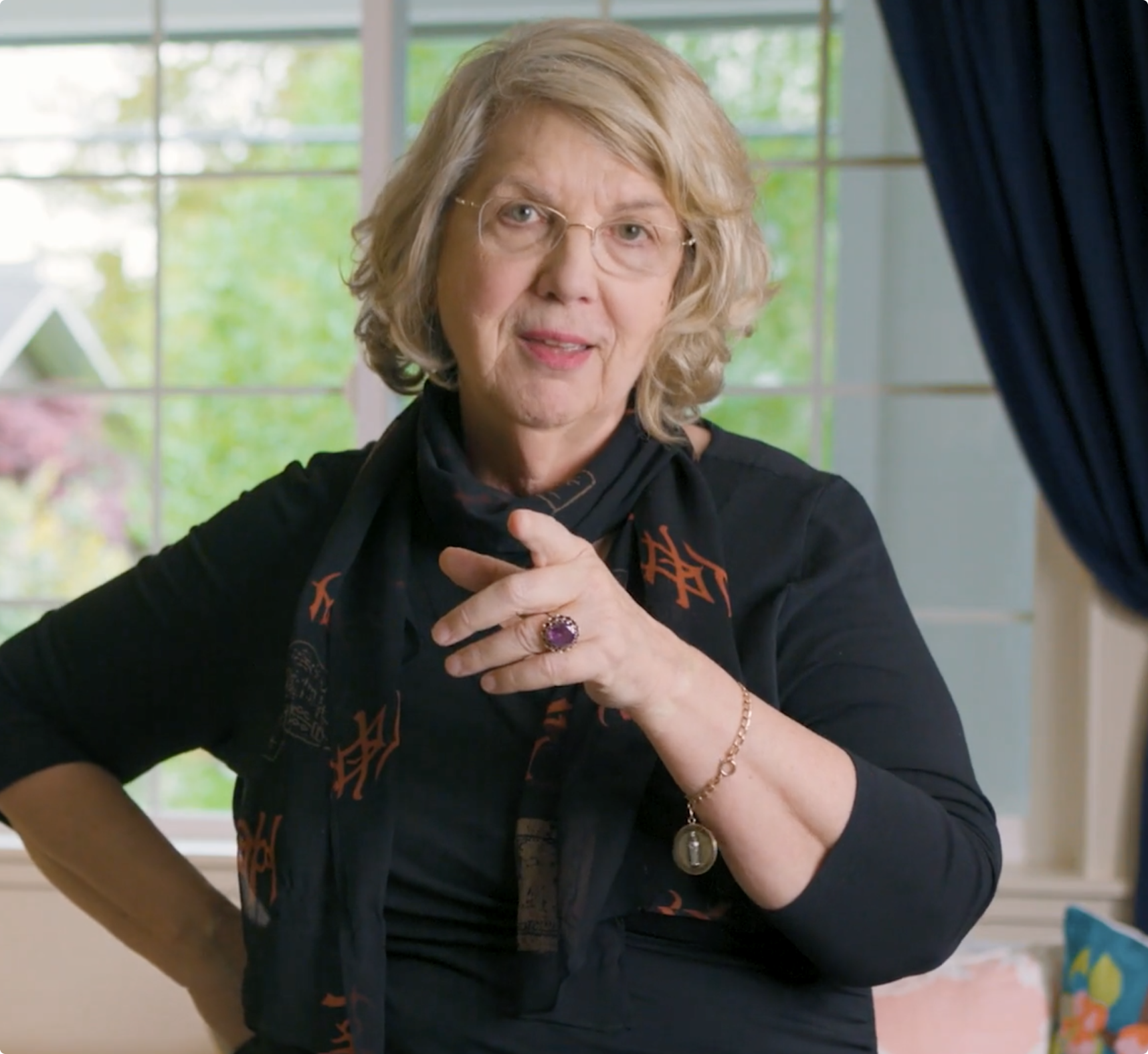 Marsha Linehan speaking and smiling