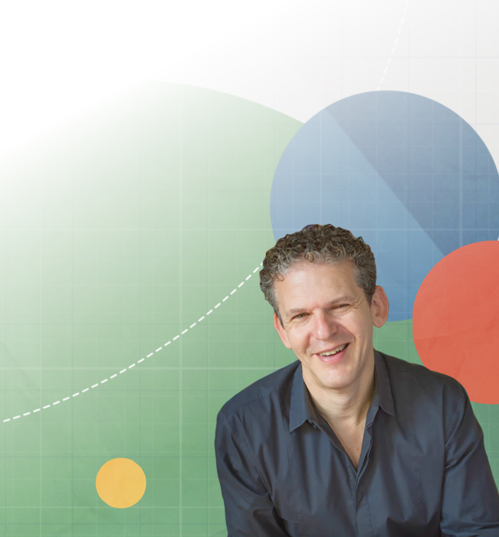 Russ Harris smiling at the camera