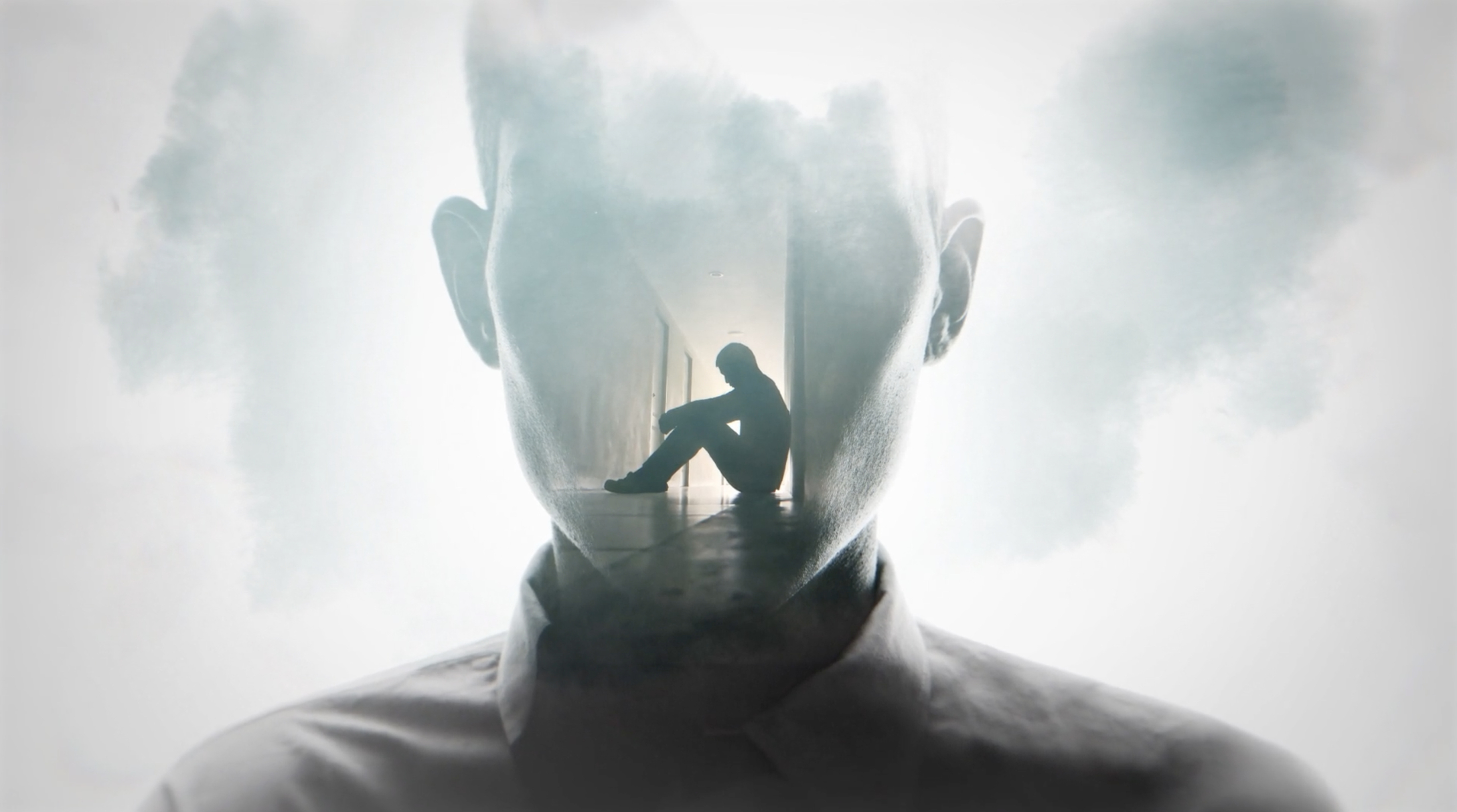 double exposure - made sitting in hallway inside face of a man