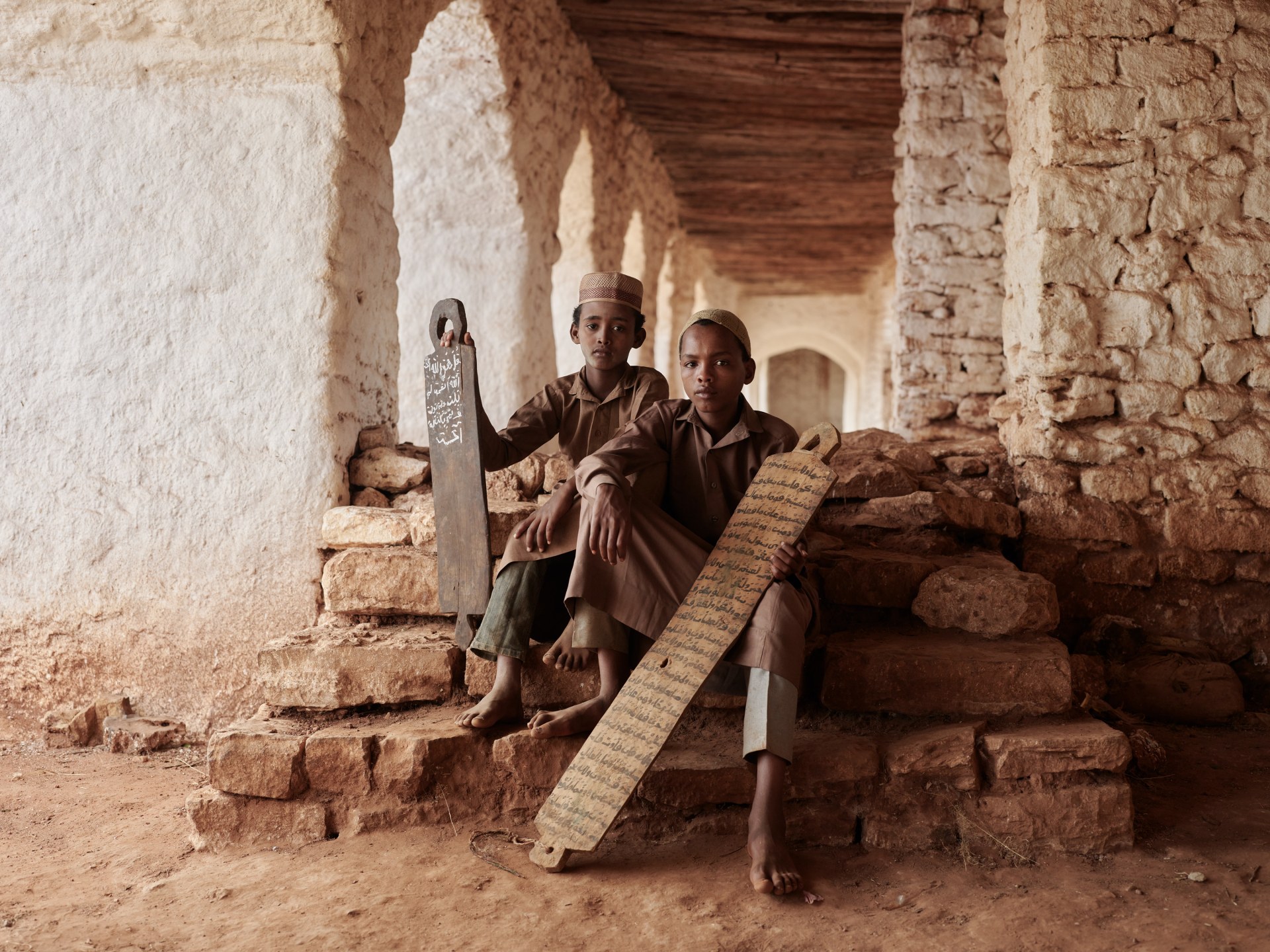 Quran students use ink and chalk to write on reusable wooden tablets. Sheikh Hussein, Bale, Oromia Region, Ethiopia.
Location - Ethiopia Medium - digital capture Series - Ethiopia