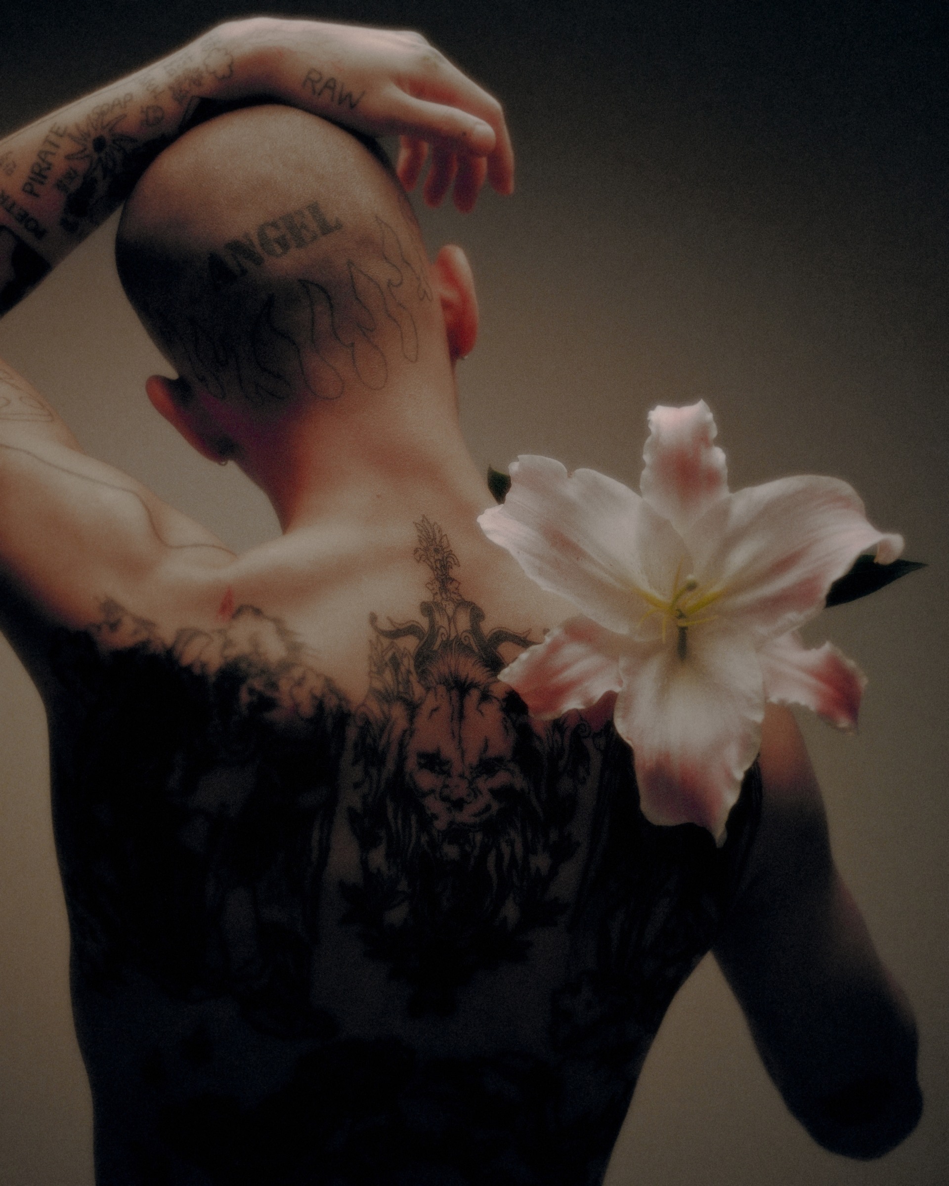 In Fearless Flowers, NOT FOR EVERYONE - Volume 2
Marcin T. Jozefiak explores gender, sexuality, gaze, and identity in South Korea. Not interested in nudity for nudity's sake, the photographer strives to present sitters as self secure. Adorned with flowers, the human body represents a universal innocence, timelessness, and purity.