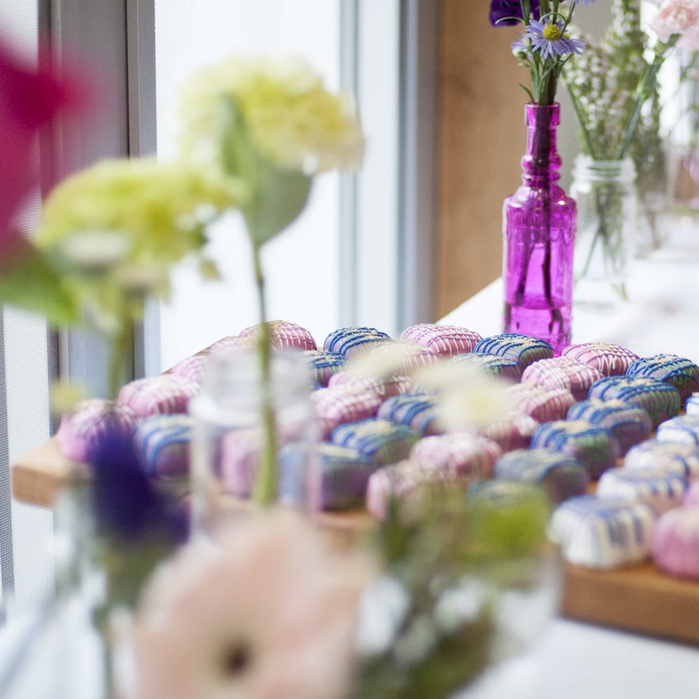 recycled jars used in colorful wedding decorations