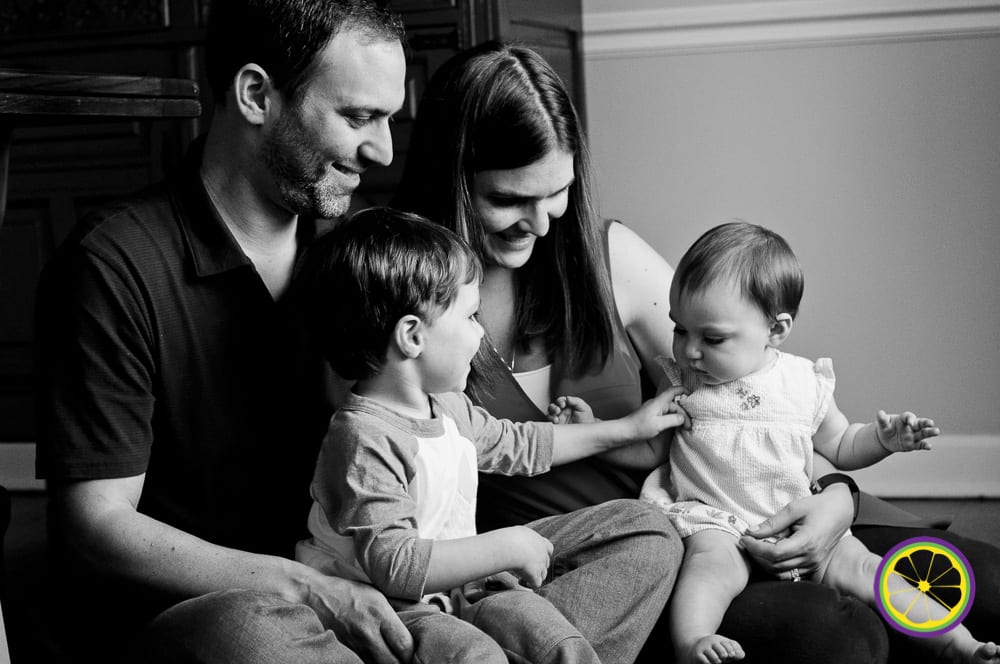 engaged family portrait sitting down with baby