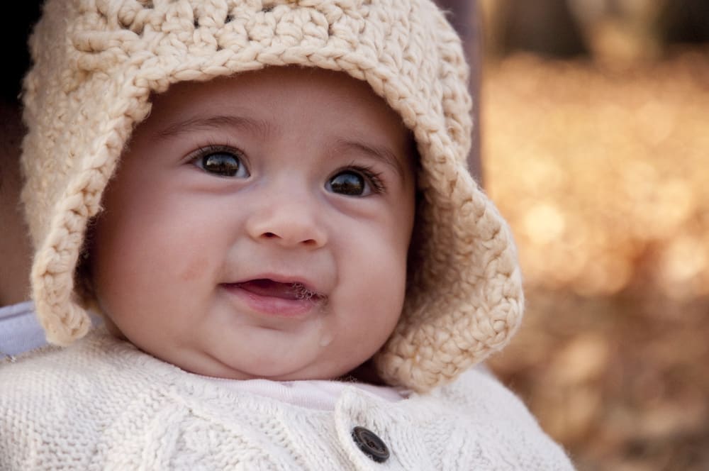 baby girl in handmade hat in South City St. Louis