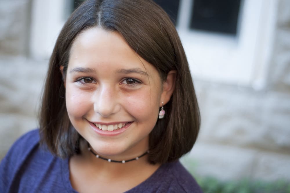 young teen girl photo smiling with dark hair