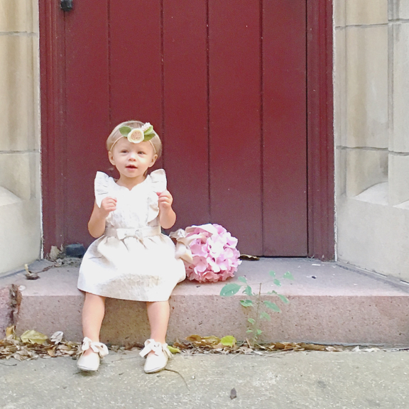 Rose sitting on a stoop