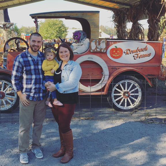 Our family in front of a wagon at the pumpkin patch