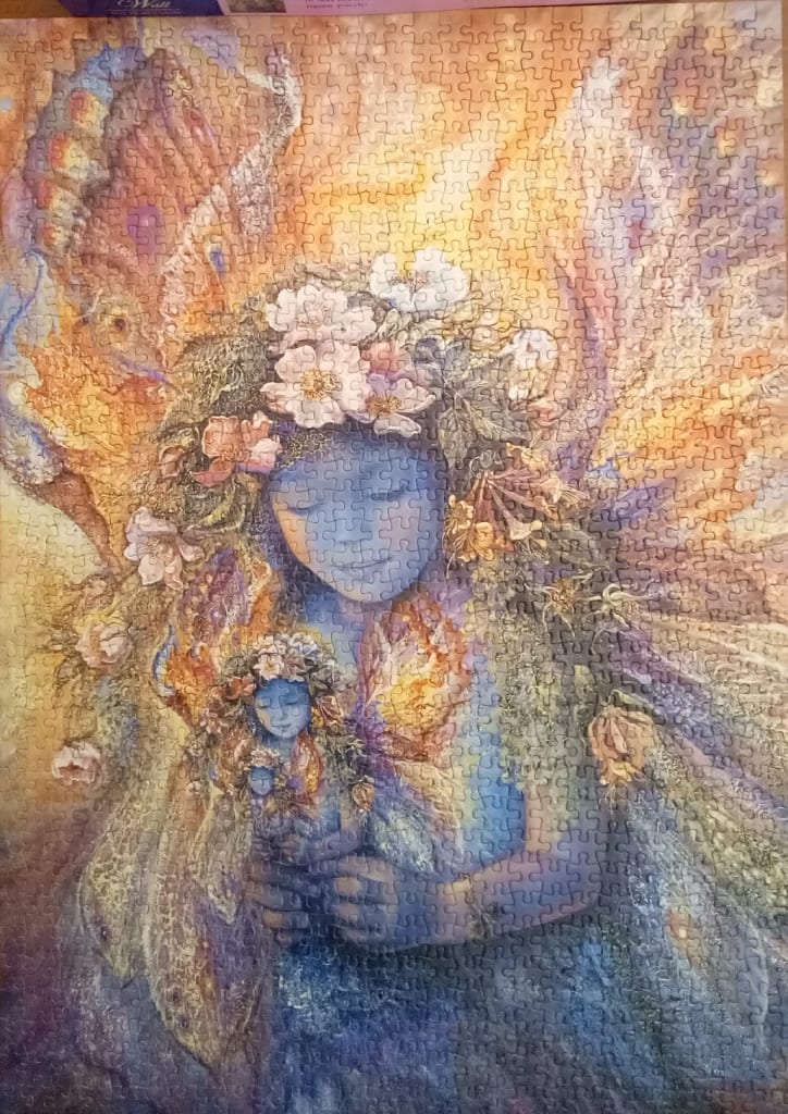 An ethereal painting of a blue-skinned mother cradling a child, surrounded by flowers and butterfly wings.