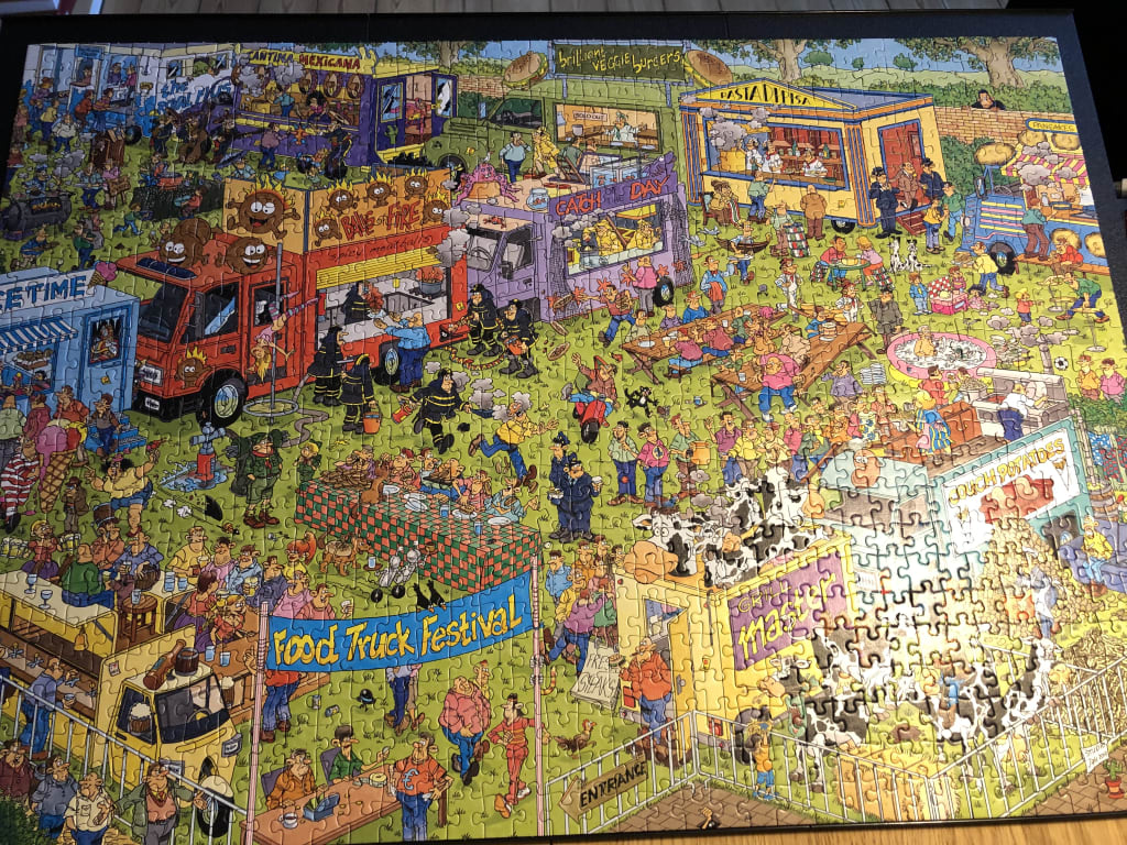 Cartoon illustration of a busy food truck festival with many food stalls and people