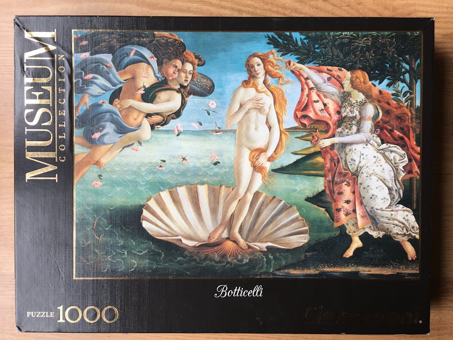 The Birth of Venus by Sandro Botticelli featuring Venus standing on a giant scallop shell with wind gods and a handmaiden.