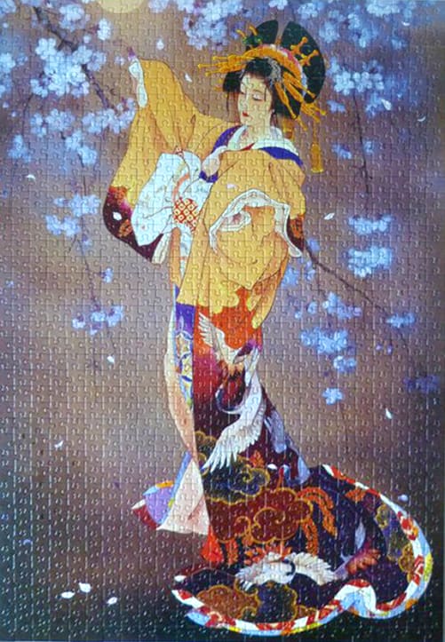 An elegant woman in a traditional kimono standing beneath blooming cherry blossoms.