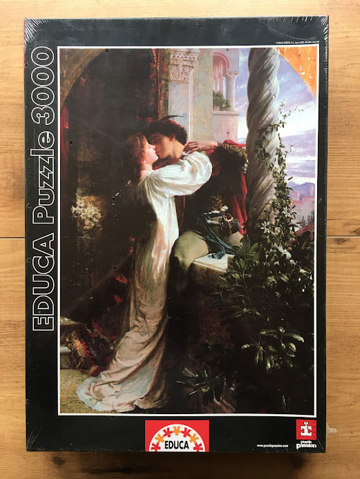 A romantic oil painting of a couple kissing on a stone balcony, echoing the scene of Romeo and Juliet.