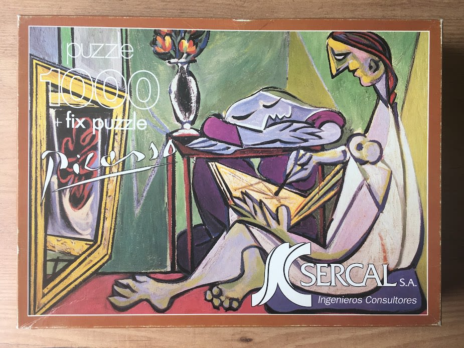 A Cubist-style painting of a woman sitting and drawing at a table, with a stylized vase of flowers nearby.