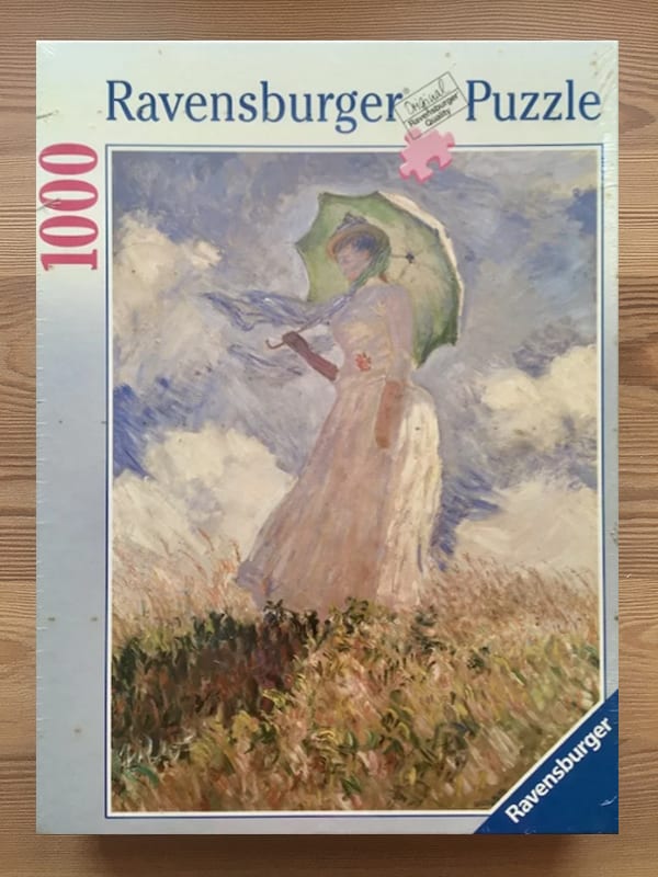 An impressionist painting of a woman holding a green parasol standing in a windswept meadow under a cloudy sky.