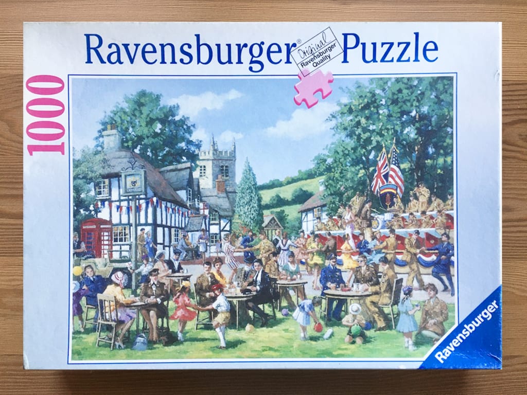 A nostalgic painting of a 1940s-style street party in a British village.