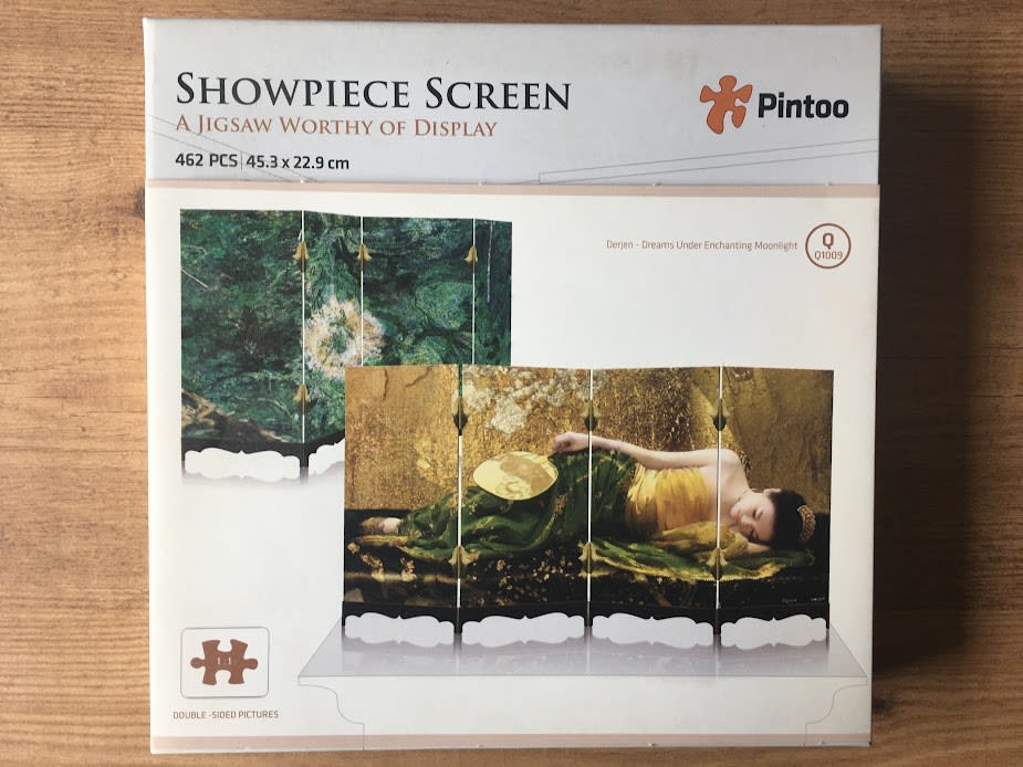 A double-sided room divider screen featuring a reclining woman on one side and a dark green marbled texture on the other.