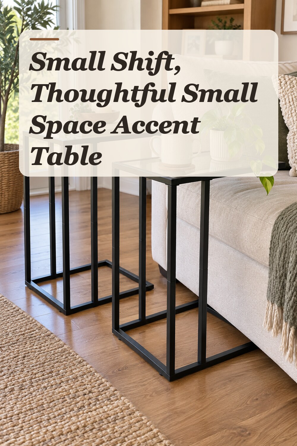 A c-shaped side table used in a comfortable apartment living room with natural window light and practical everyday styling.