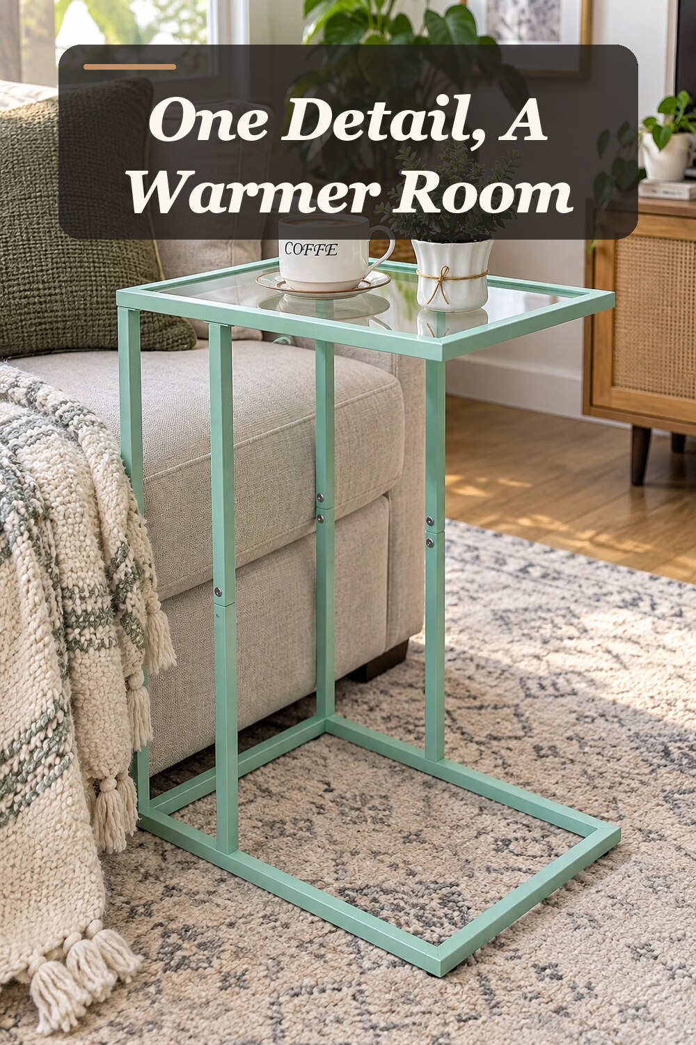 A c-shaped side table used in a comfortable apartment living room with natural window light and practical everyday styling.