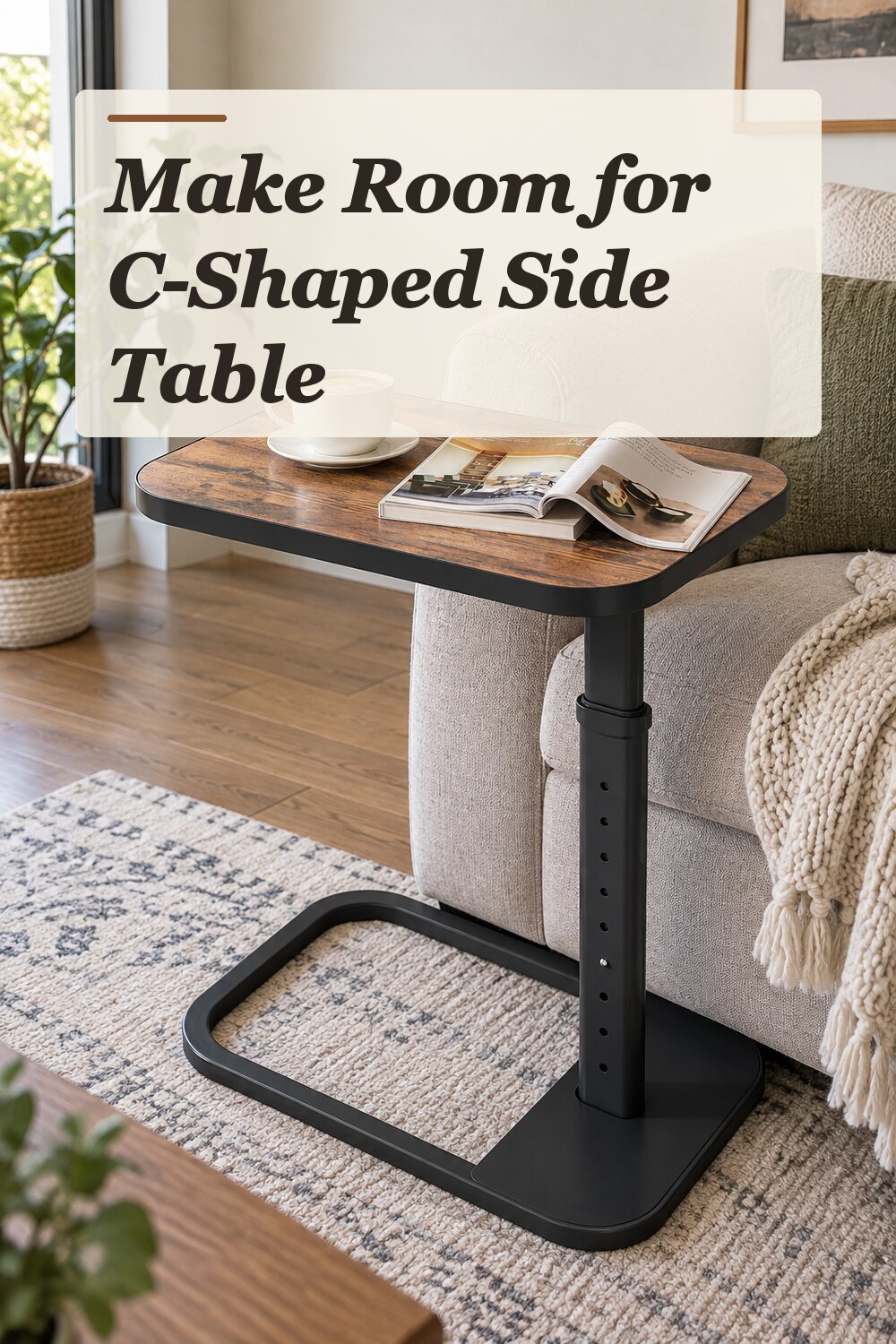 A c-shaped side table used in a comfortable apartment living room with natural window light and practical everyday styling.