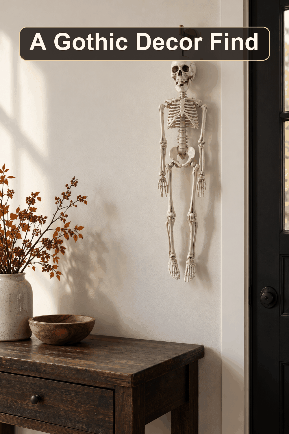 Styled Halloween home scene featuring the Hanging Halloween Skeleton, 20", with the words A Gothic Decor Find in a dark banner above.