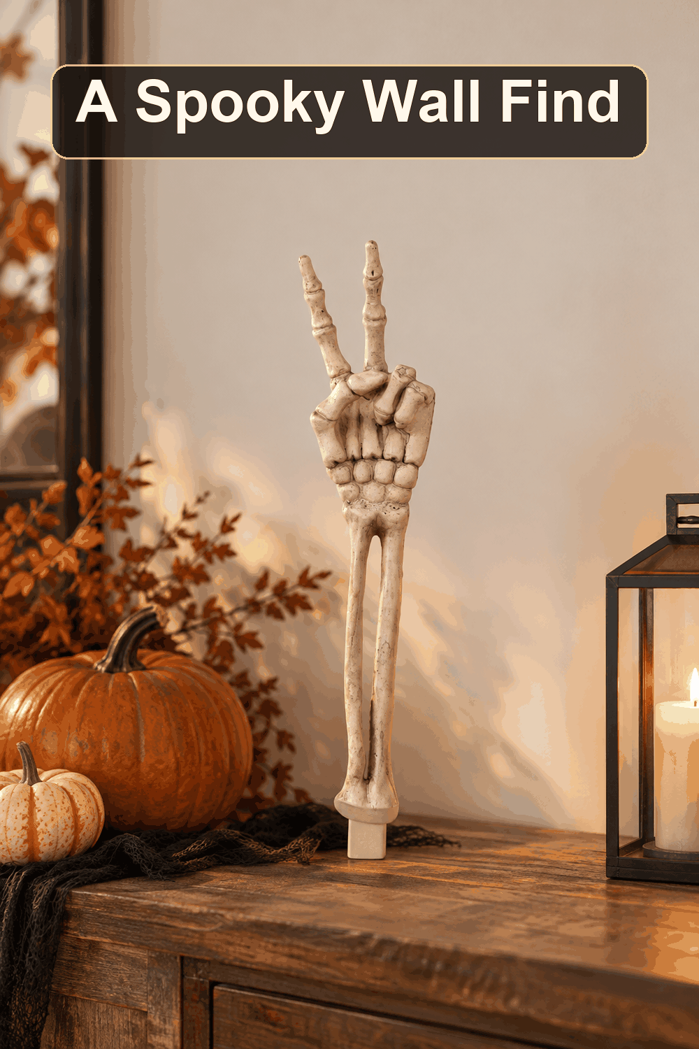 Styled Halloween home scene featuring the Peace Sign Skeleton Hand, 18.5", with the words A Spooky Wall Find in a dark banner above.