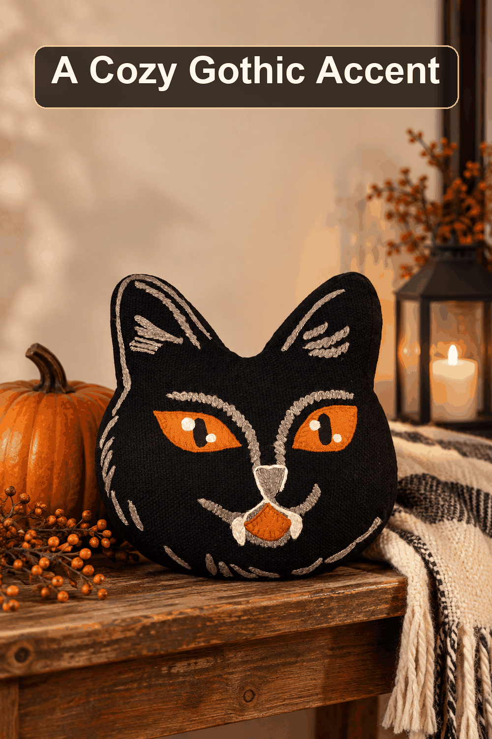 Styled Halloween home scene featuring the Cat Face Shaped Throw Pillow, 13", with the words A Cozy Gothic Accent in a dark banner above.