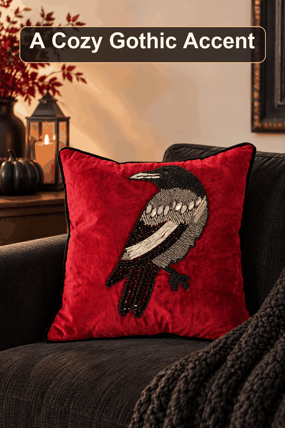 Styled Halloween home scene featuring the Red Velvet Fully Beaded Raven Throw Pillow, 18", with the words A Cozy Gothic Accent in a dark banner above.
