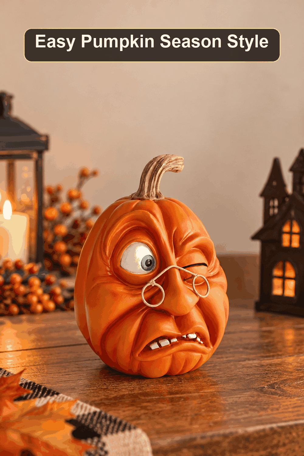 Styled Halloween home scene featuring the Orange Polyresin Pumpkin Character, 4.7", with the words Easy Pumpkin Season Style in a dark banner above.