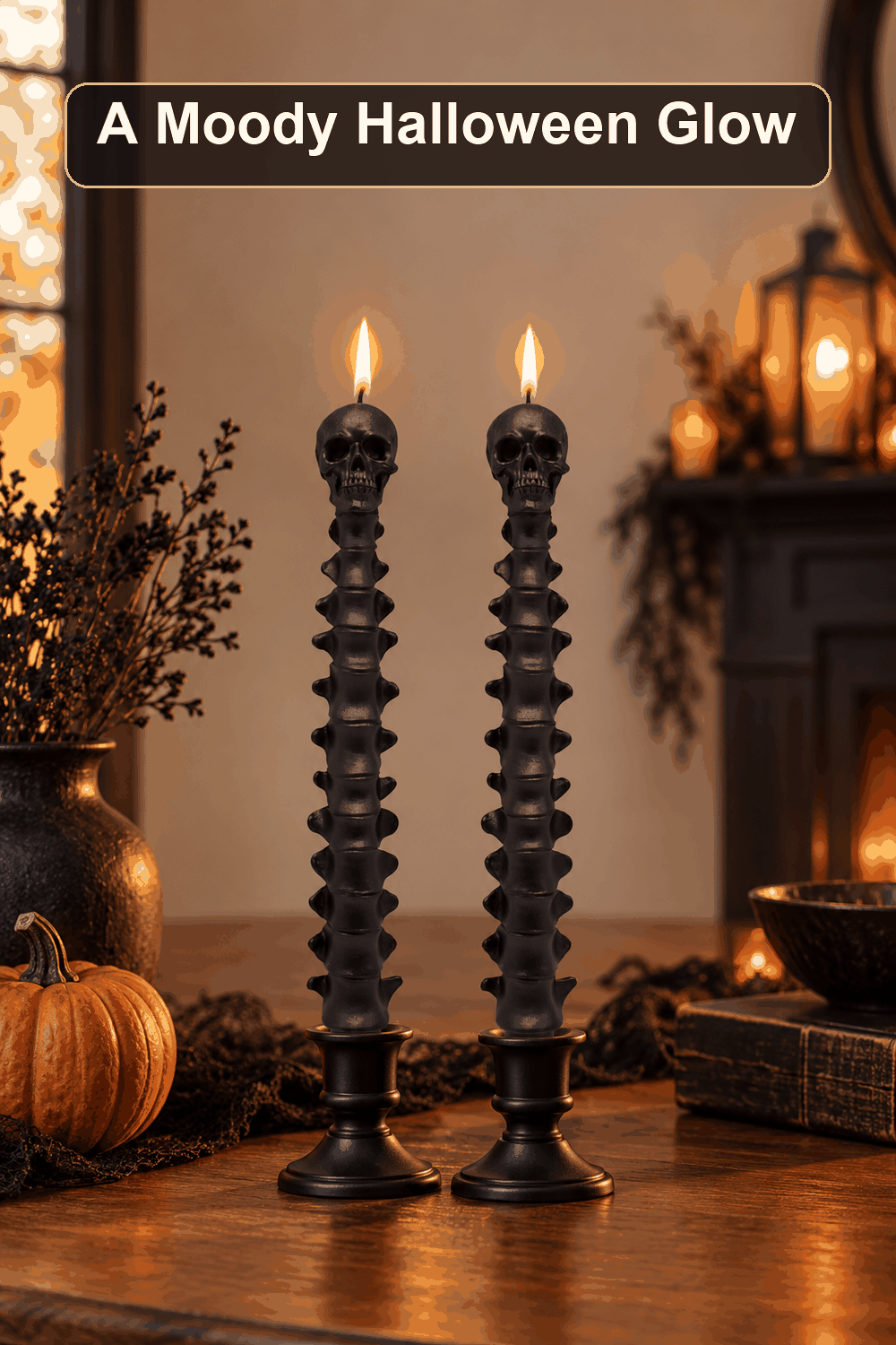Styled Halloween home scene featuring the 2-Count Skull Taper Candle, 10", with the words A Moody Halloween Glow in a dark banner above.