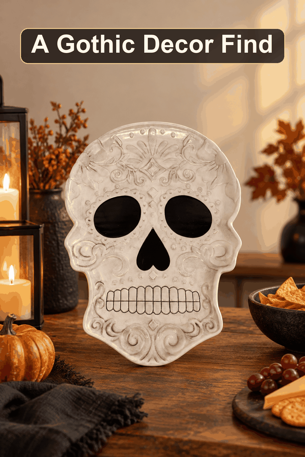 Styled Halloween home scene featuring the Ceramic White Skull Serving Platter, 14", with the words A Gothic Decor Find in a dark banner above.