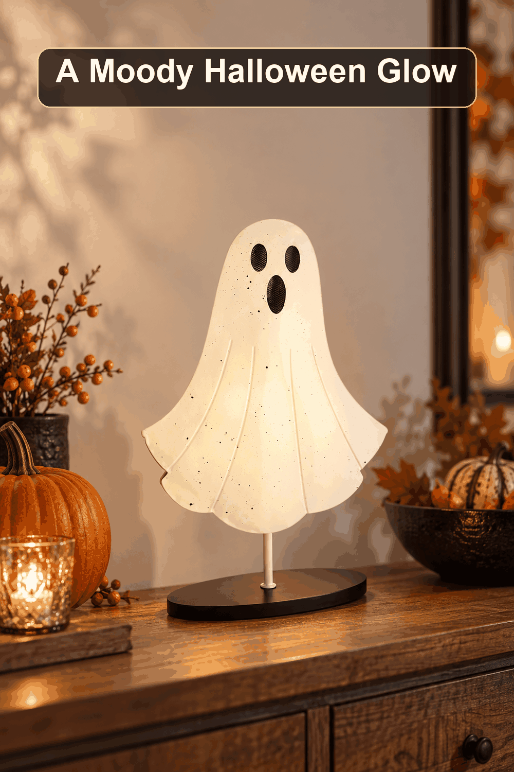 Styled Halloween home scene featuring the LED Ghost Tabletop Decor, 20", with the words A Moody Halloween Glow in a dark banner above.