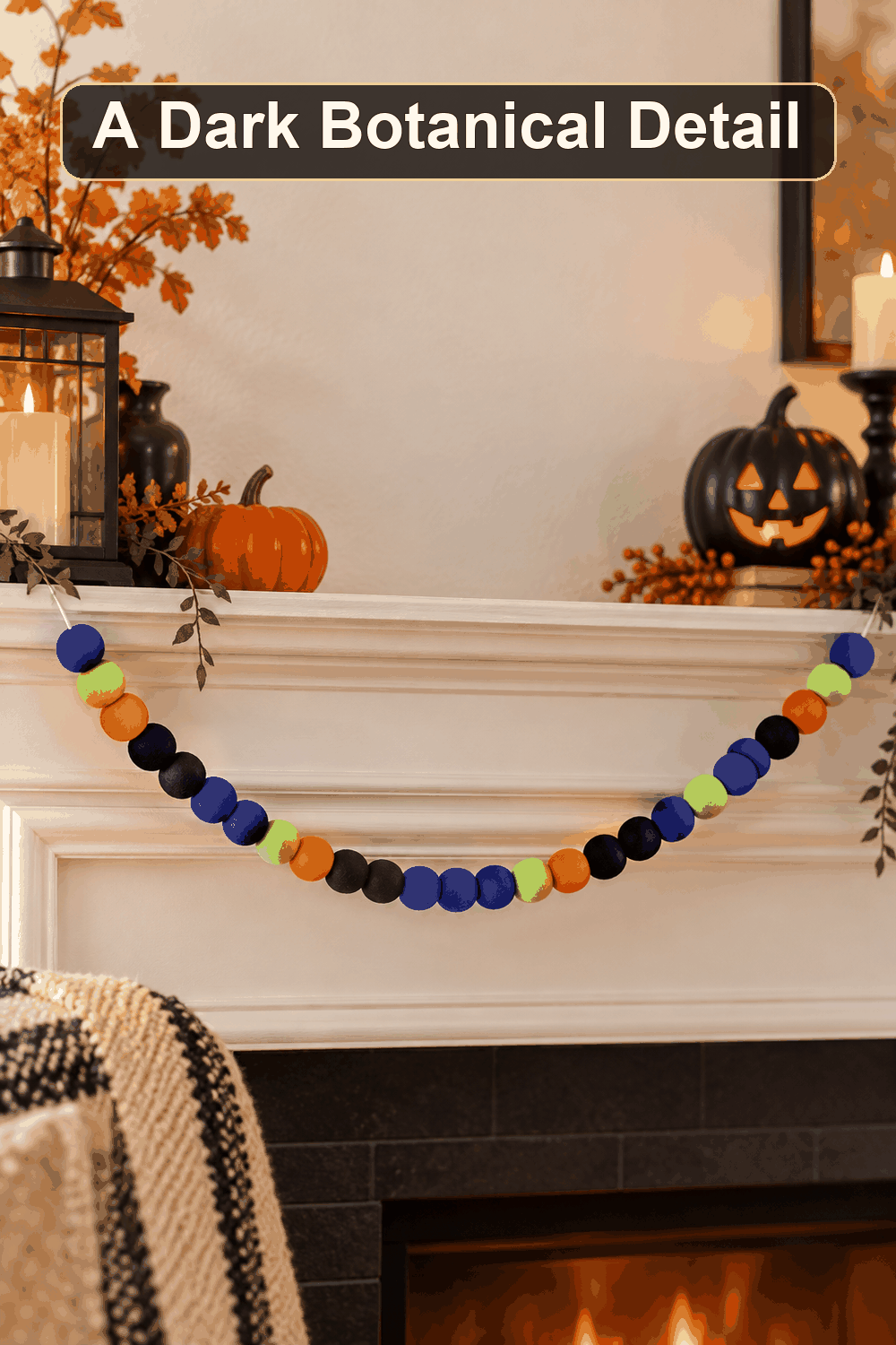 Styled Halloween home scene featuring the Multicolor Fabric Ball Garland, 72", with the words A Dark Botanical Detail in a dark banner above.