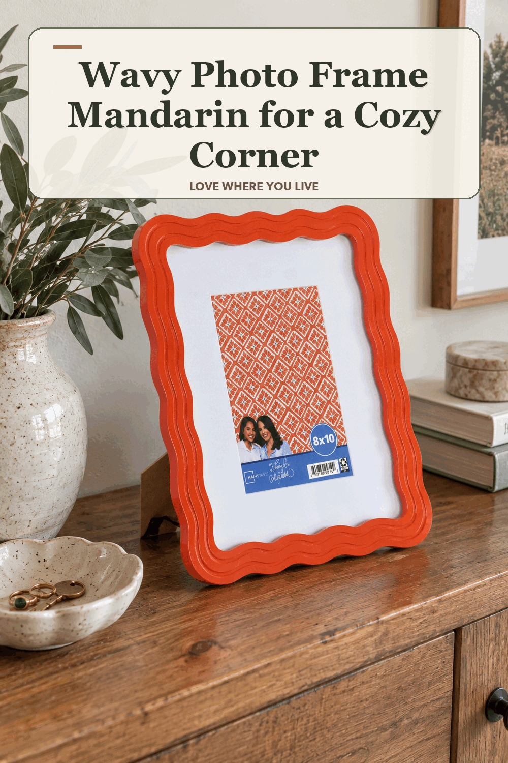 A realistic lived-in home scene featuring the exact Becky G Alejandra Wavy Photo Frame Mandarin 8 x 10, beneath the words Wavy Photo Frame Mandarin for a Cozy Corner.
