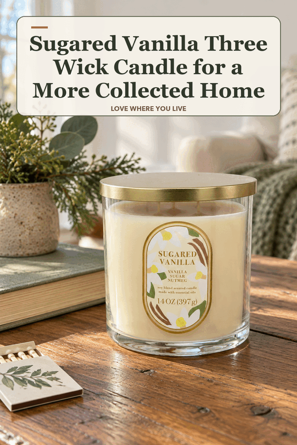 A realistic lived-in home scene featuring the exact Sonoma Goods for Life Sugared Vanilla Three Wick Candle, beneath the words Sugared Vanilla Three Wick Candle for a More Collected Home.