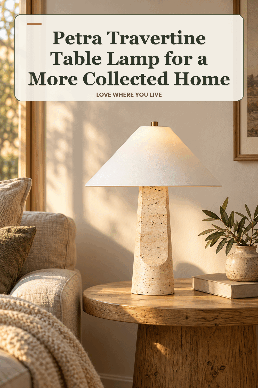 A realistic lived-in home scene featuring the exact Petra Travertine Table Lamp, beneath the words Petra Travertine Table Lamp for a More Collected Home.