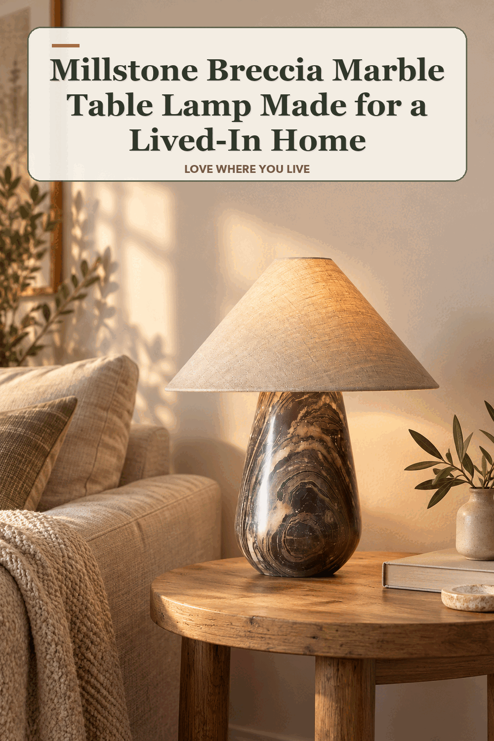 A realistic lived-in home scene featuring the exact Millstone Breccia Marble Table Lamp, beneath the words Millstone Breccia Marble Table Lamp Made for a Lived-In Home.