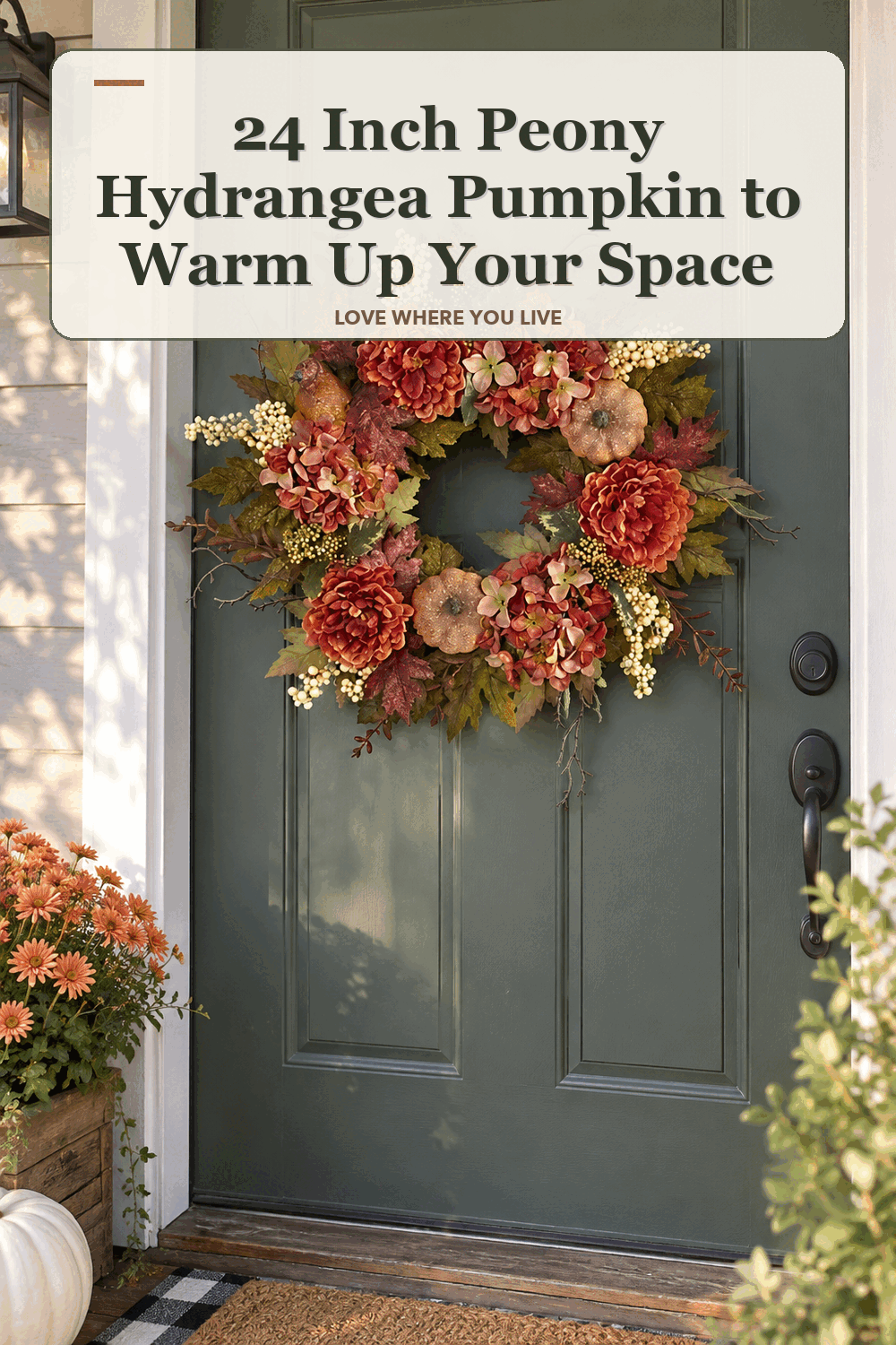 A realistic lived-in home scene featuring the exact Nearly Natural 24 Inch Peony Hydrangea Pumpkin Fall Wreath, beneath the words 24 Inch Peony Hydrangea Pumpkin to Warm Up Your Space.