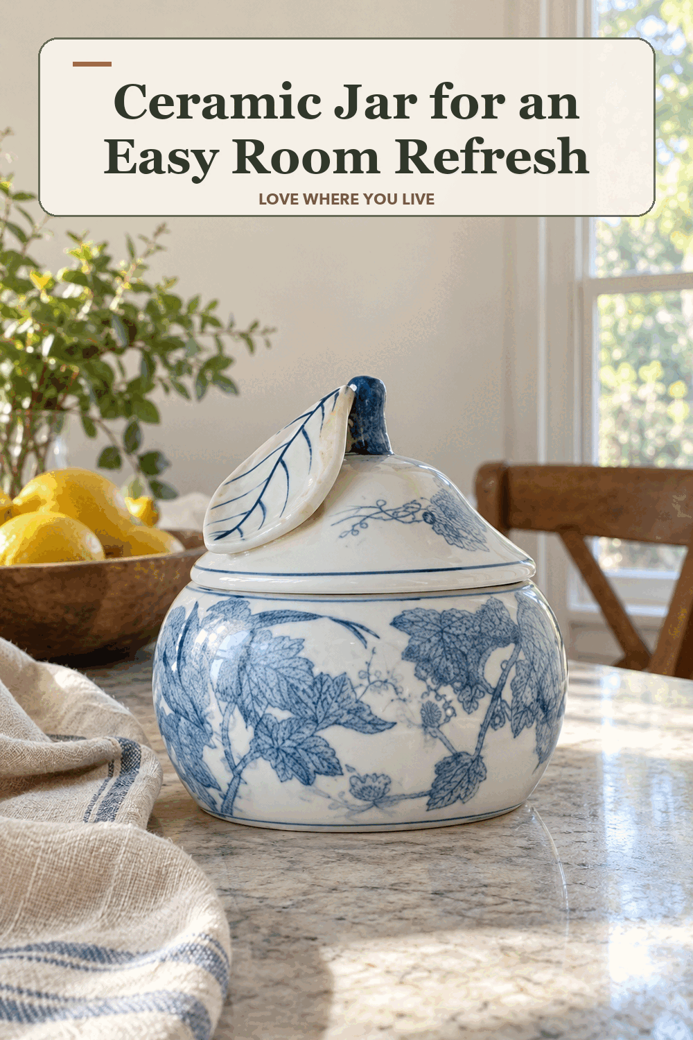 A realistic lived-in home scene featuring the exact Biltmore Ceramic Jar, beneath the words Ceramic Jar for an Easy Room Refresh.