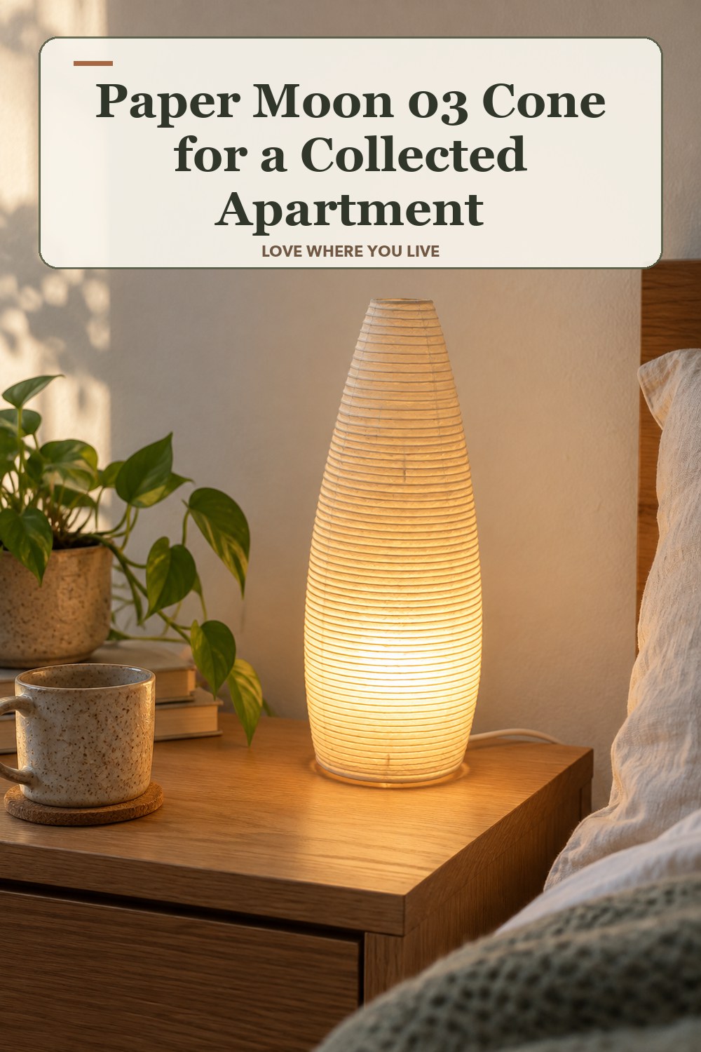 Warm natural-light apartment scene featuring the exact Paper Moon 03 Cone in shown finish, with the headline: Paper Moon 03 Cone for a Collected Apartment.