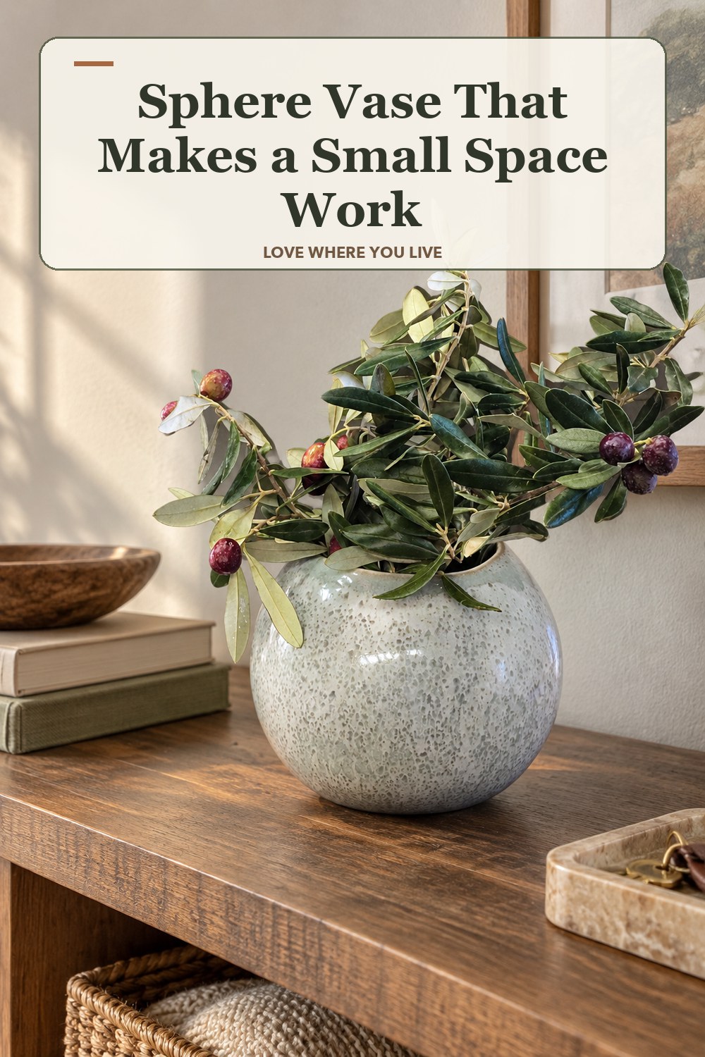 Warm natural-light apartment scene featuring the exact Sphere Vase in Speckled Blue Small: 5.5 in diameter, with the headline: Sphere Vase That Makes a Small Space Work.