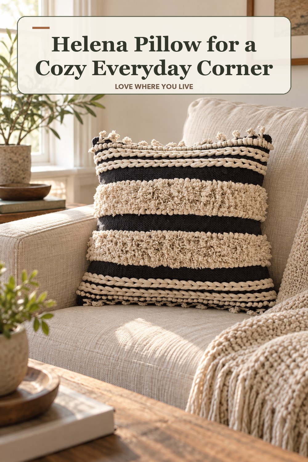 Warm natural-light apartment scene featuring the exact Helena Pillow in Black Cream Small: 18 in W x 18 in H, with the headline: Helena Pillow for a Cozy Everyday Corner.