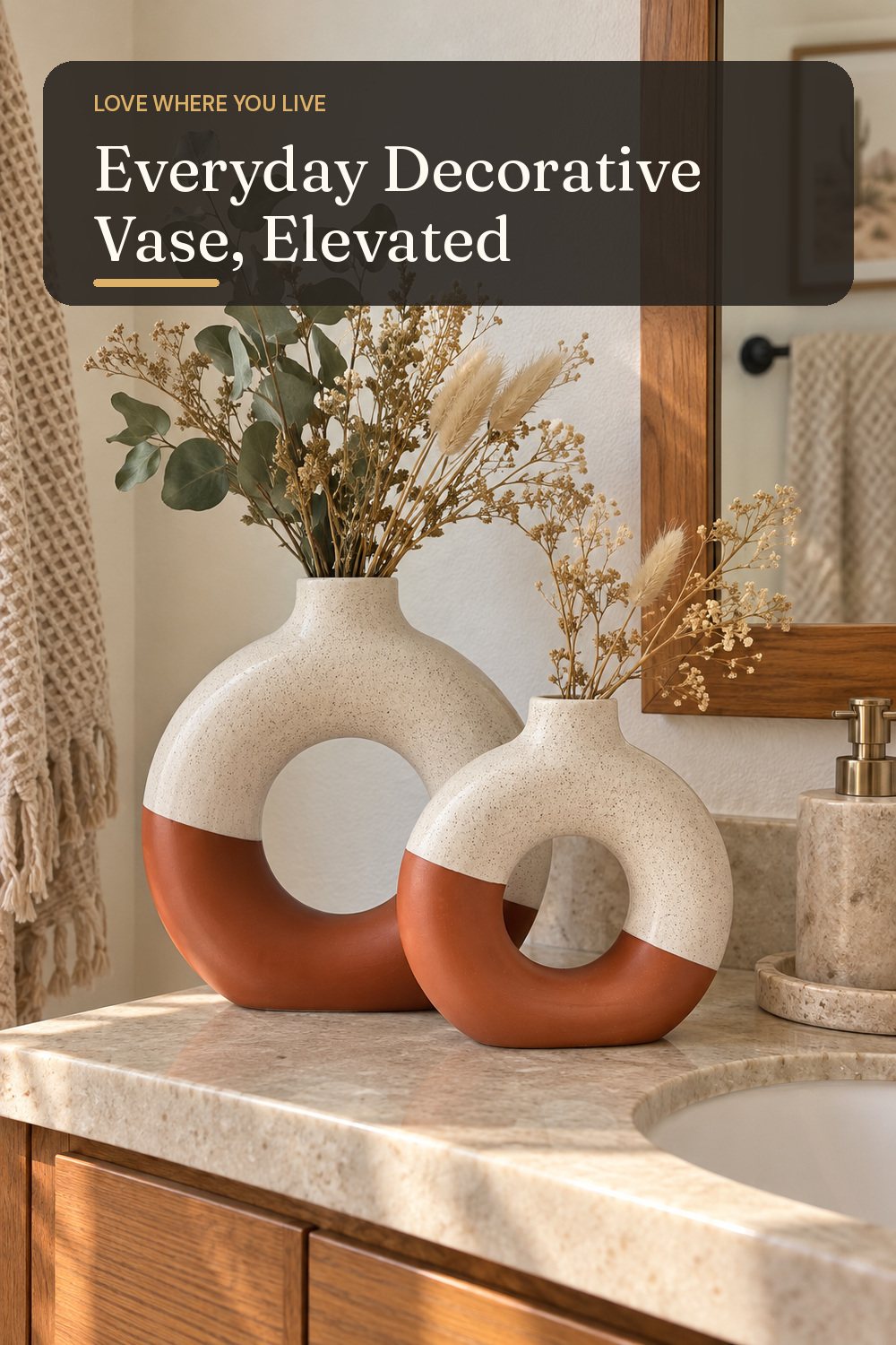 A decorative vase used in a warm everyday bathroom with natural window light and practical everyday styling.