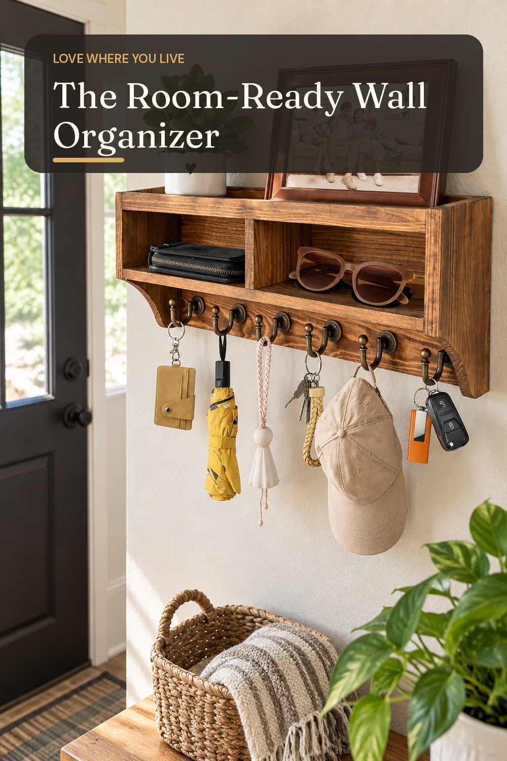 A wall organizer used in a busy family entry or kitchen wall with natural window light and practical everyday styling.