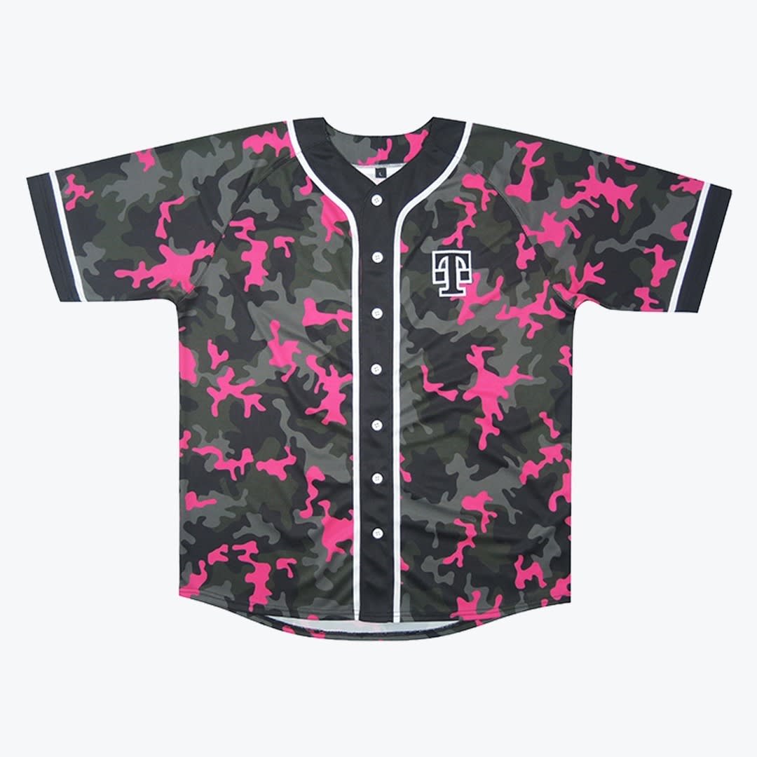 Pink Camouflage Baseball Jersey A short-sleeved baseball jersey with a hot pink, black, and grey camouflage pattern, featuring a white 'T' logo on the left chest and white piping details.