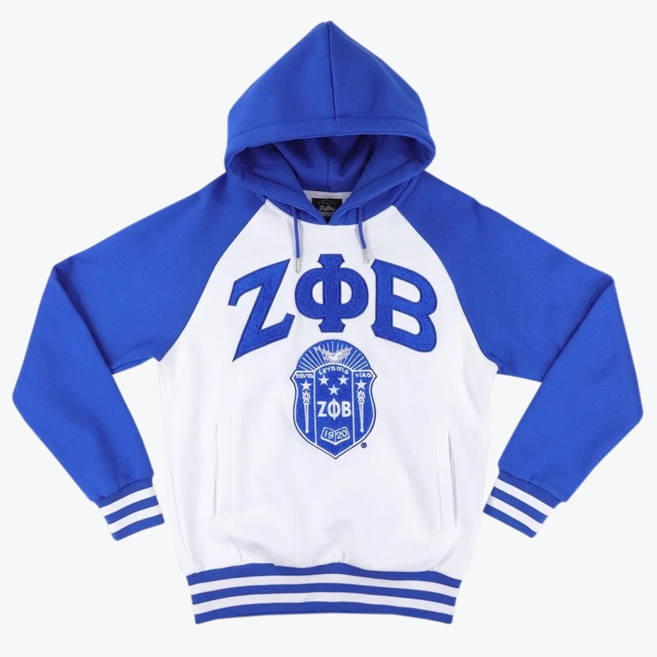 Zeta Phi Beta Greek Letter and Shield Raglan Hoodie A royal blue and white raglan hoodie with the Greek letters ZΦB and the Zeta Phi Beta shield embroidered on the front.