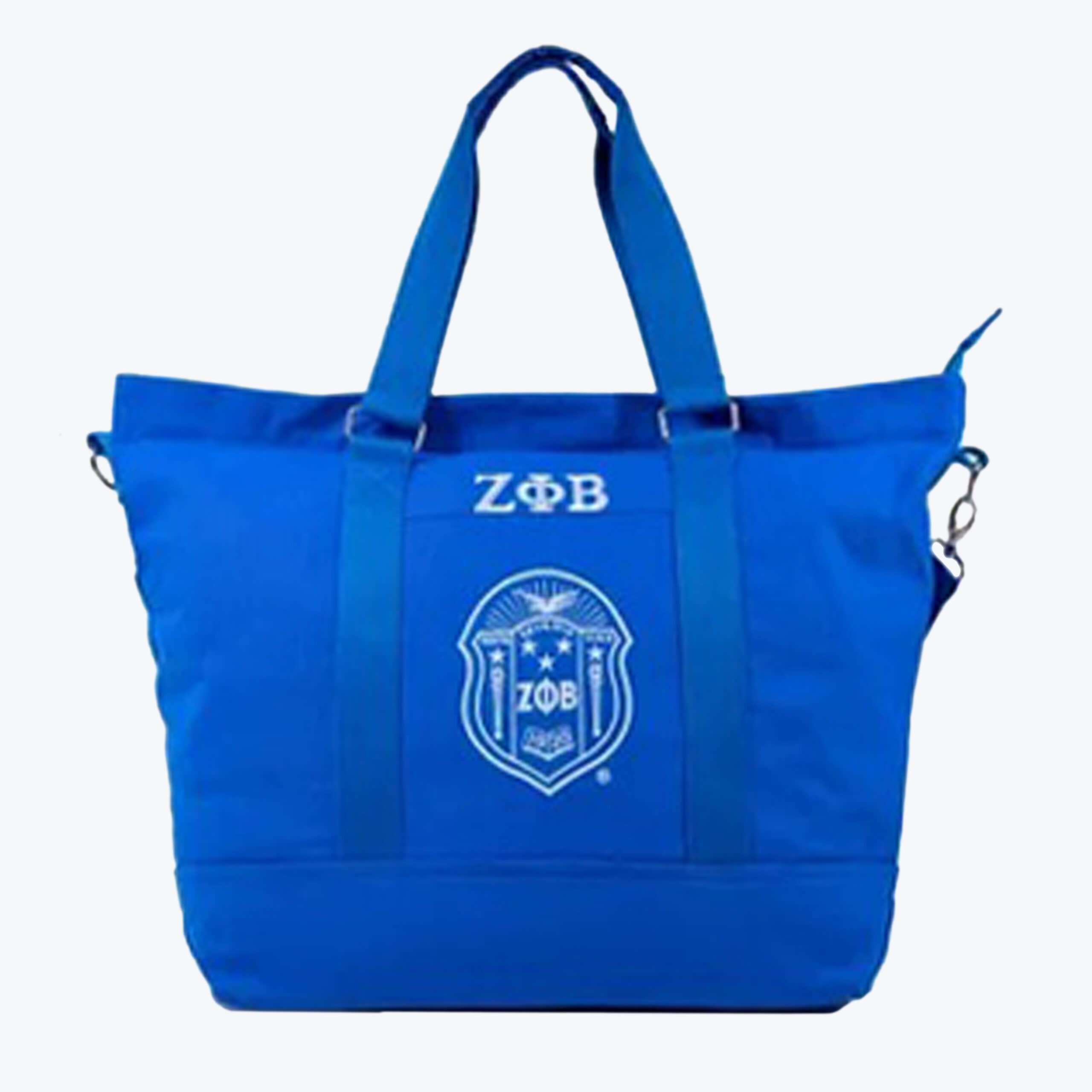 Zeta Phi Beta Blue Tote Bag Royal blue tote bag with white Zeta Phi Beta Greek letters and shield emblem on the front.